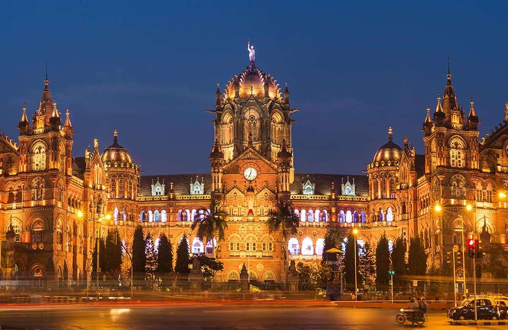 "Chhatrapati Shivaji Terminus - Majestic Victorian-era railway station in Mumbai, showcasing exquisite architectural details and bustling transportation hub."