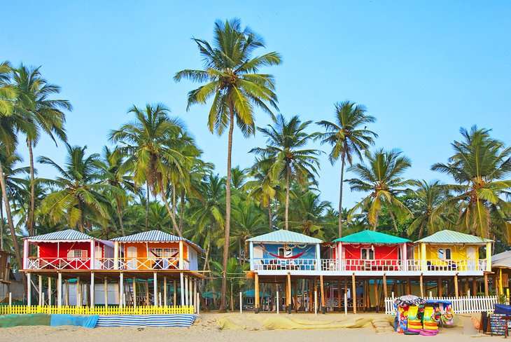 Goa Beach - A serene tropical paradise with golden sands, sparkling blue waters, and palm-fringed coastline, offering a perfect escape for beach lovers and relaxation seekers."