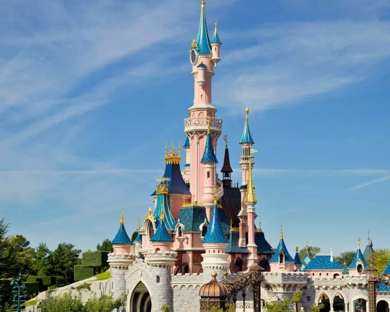 "Castle of Disneyland: Iconic fairy-tale castle embodying the magic and wonder of Disney."