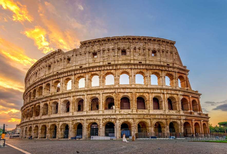 "Colosseum in Rome: Iconic ancient amphitheater showcasing Roman architectural magnificence and historical significance."