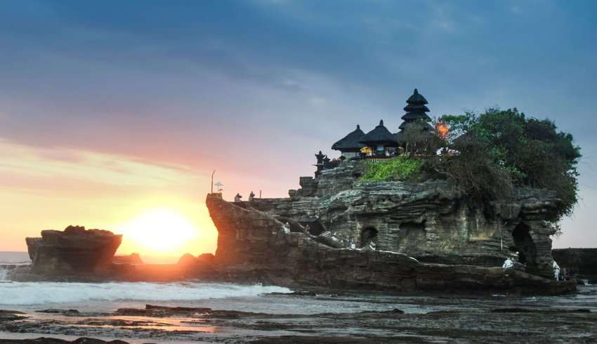 "Tanah Lot temple with the beautiful sunset in Bali"