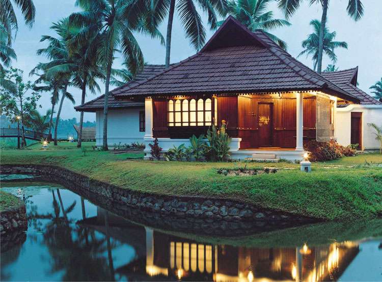 "Kumarakom Lake Resort in Kerala, South India - luxurious villas and rooms with serene backwaters view, Ayurvedic spa, organic farm, and more."