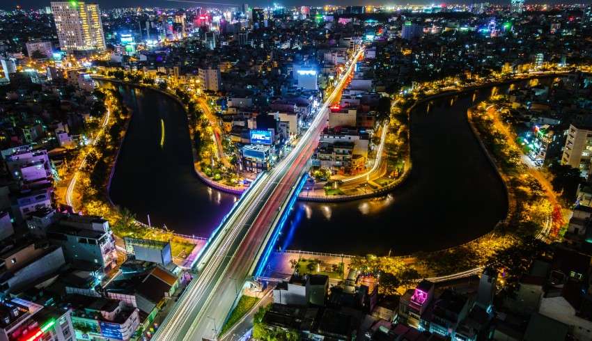 "Night view of a tranquil oasis in Ho Chi Minh City glowing with lights, captured by a drone"