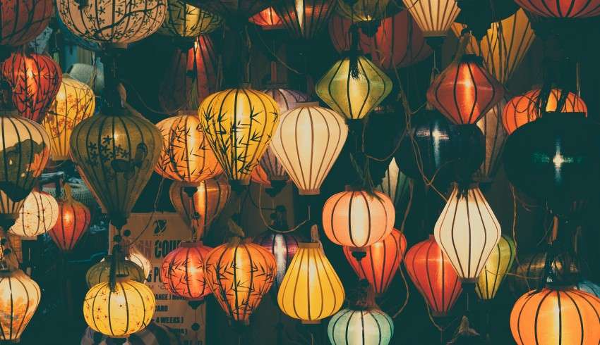 "Colorful lanterns illuminating the streets of Vietnam at night"