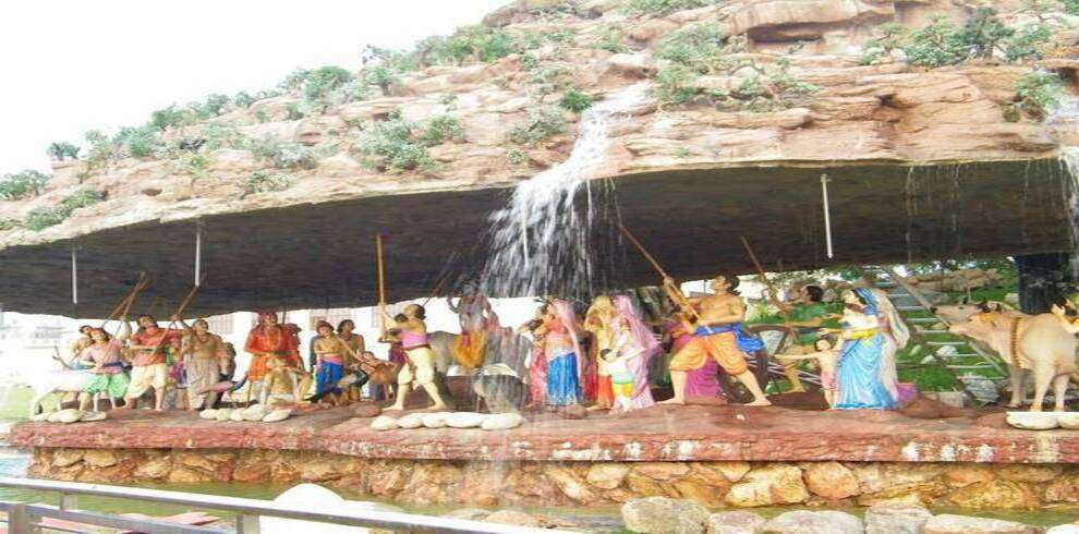 "Statue of Lord Krishna lifting Govardhan Parvat at Prem Mandir, Vrindavan, India"